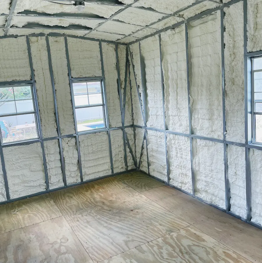 Closed-cell spray foam insulation applied to wall cavities in a residential project in Clover